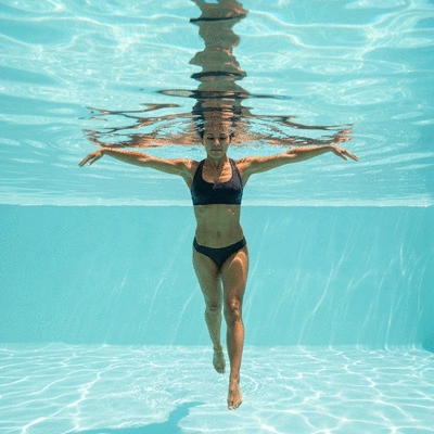 User engaging in movement therapy such as swimming or walking